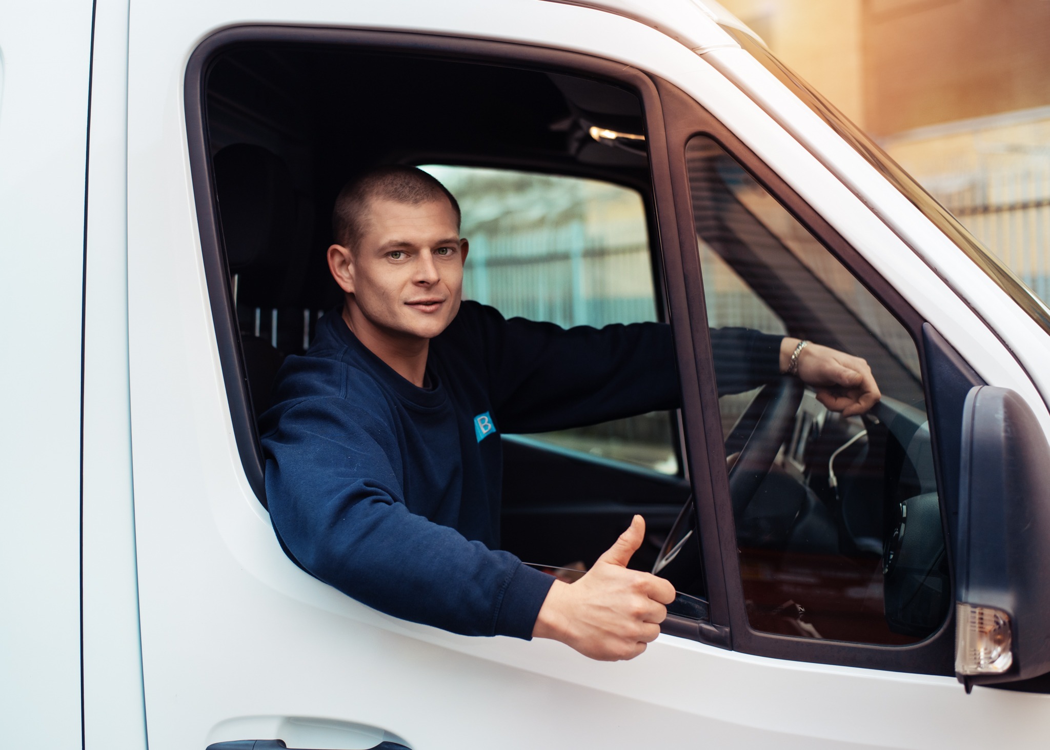 BTB driver in a panel van